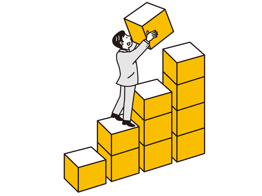 積み木を積み上げている男性