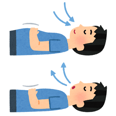 仰向けで深呼吸をしている男性