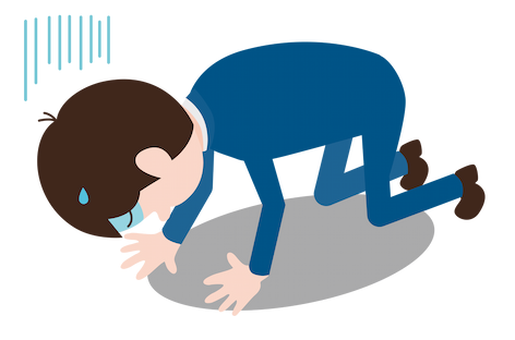 絶望しているスーツの男性